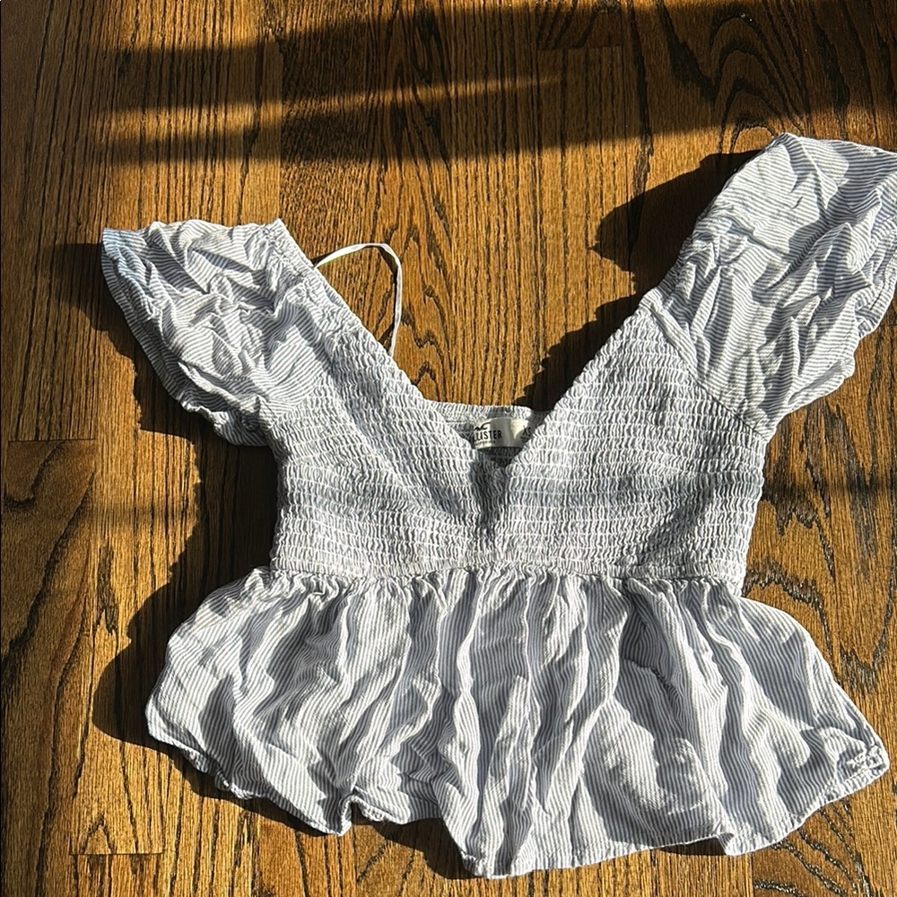 XS smocked crop top Hollister. Blue/white striped flutter sleeves